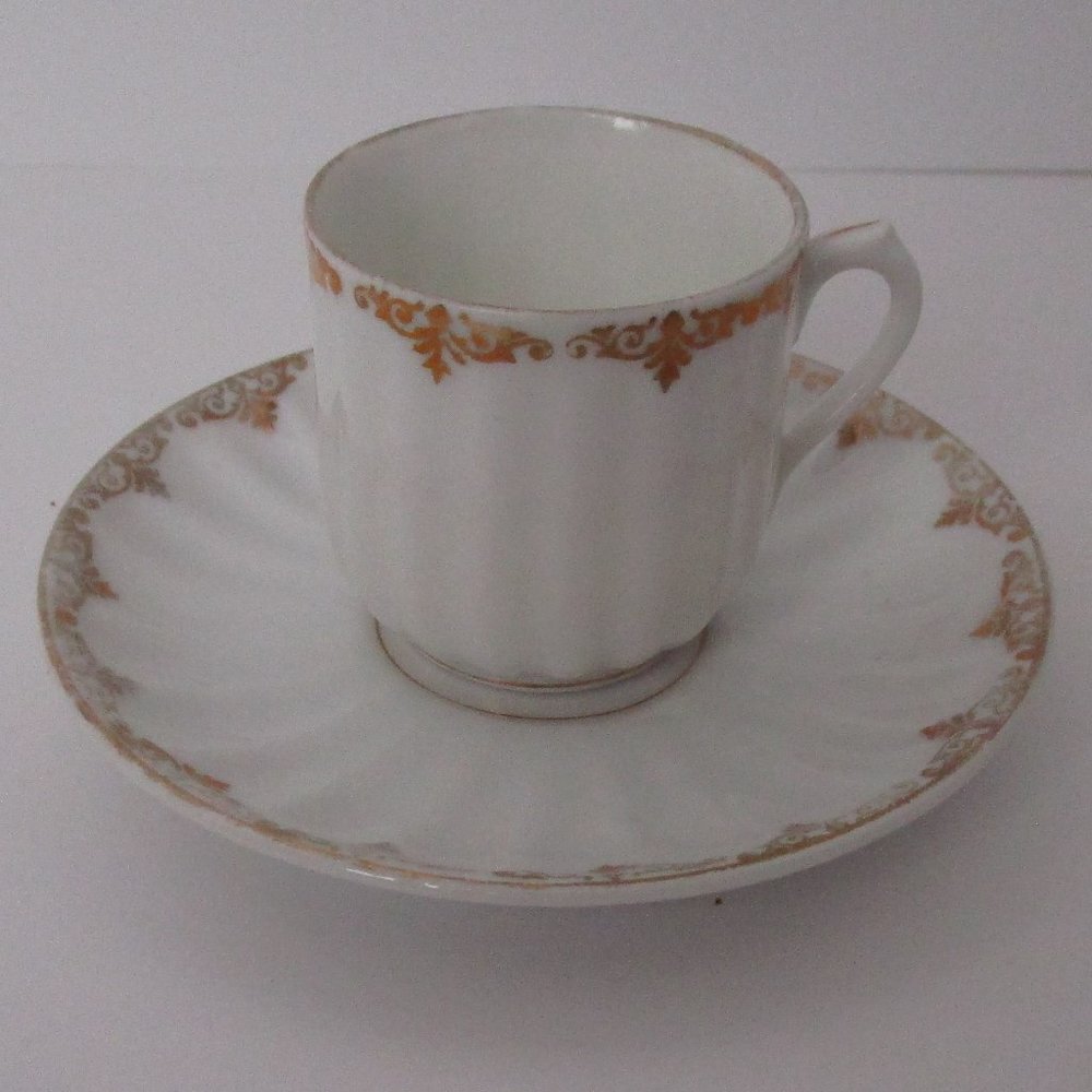 antique demitasse cup & saucer set
